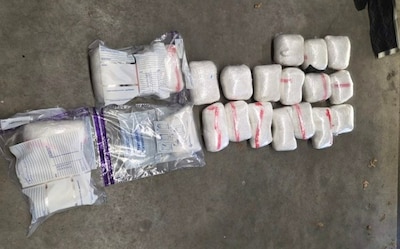 Colombianen (32 en 33) verstoppen 25 zakken drugs op bijzondere plek in huurauto, aangehouden bij Br